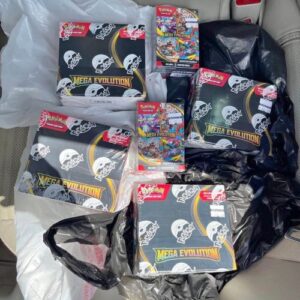4 mega evolution booster box and 2 mega evolution bundle